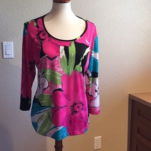 Additions, byChicos top, like the Travelers brand